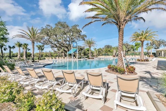 1919 Blissful Dr, Kissimmee, FL 34744 - community pool featuring a patio
