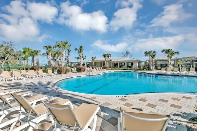 1919 Blissful Dr, Kissimmee, FL 34744 - community pool with fence and a patio