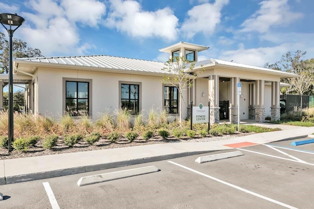 1919 Blissful Dr, Kissimmee, FL 34744 - view of property with uncovered parking