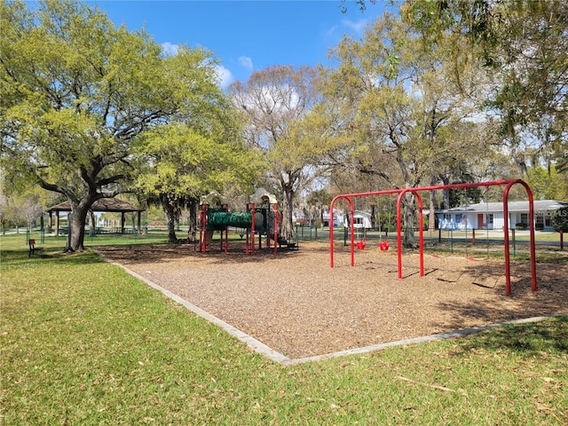 surrounding community featuring a yard and playground community