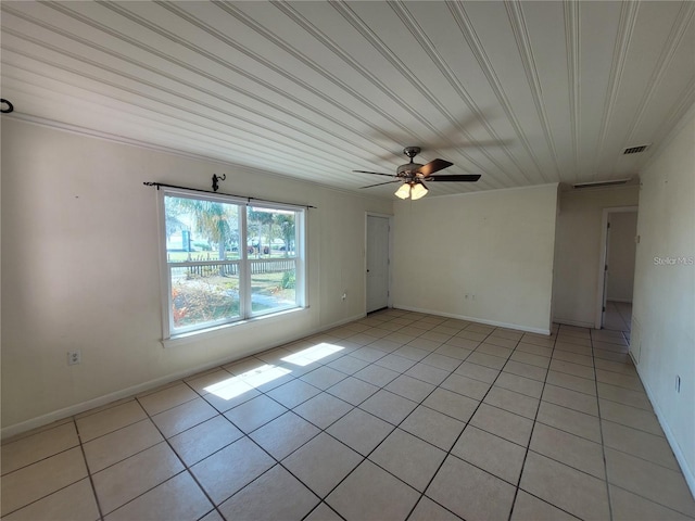 unfurnished room with visible vents, ceiling fan, light tile patterned flooring, and baseboards