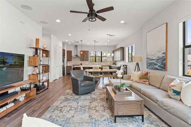 907 Arlington Ave N, Saint Petersburg, FL 33705 - living room with wood finished floors, recessed lighting, and a ceiling fan