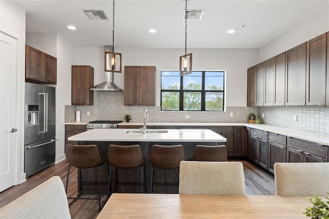907 Arlington Ave N, Saint Petersburg, FL 33705 - kitchen with light countertops, a sink, appliances with stainless steel finishes, and visible vents