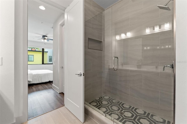 907 Arlington Ave N, Saint Petersburg, FL 33705 - ensuite bathroom with ensuite bathroom, a ceiling fan, and a shower stall