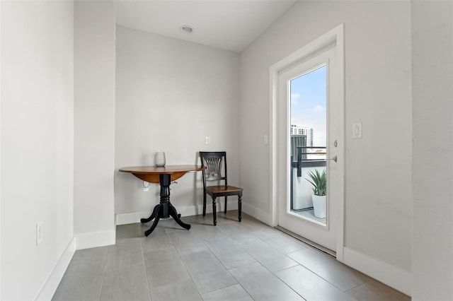 907 Arlington Ave N, Saint Petersburg, FL 33705 - interior space with tile patterned floors and baseboards