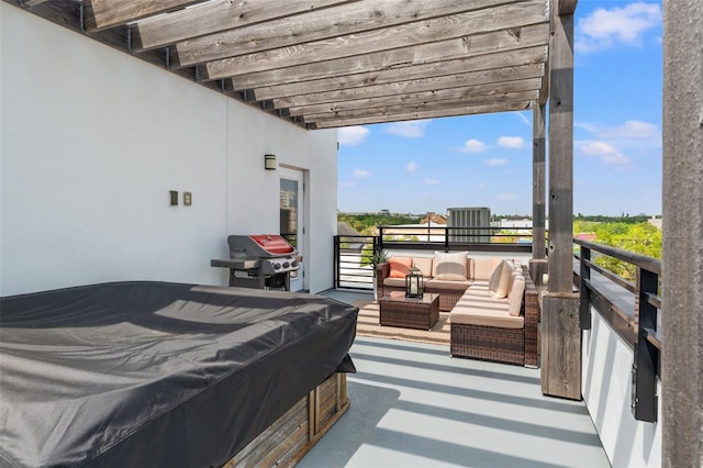 907 Arlington Ave N, Saint Petersburg, FL 33705 - exterior space with area for grilling, a hot tub, outdoor lounge area, a balcony, and a pergola