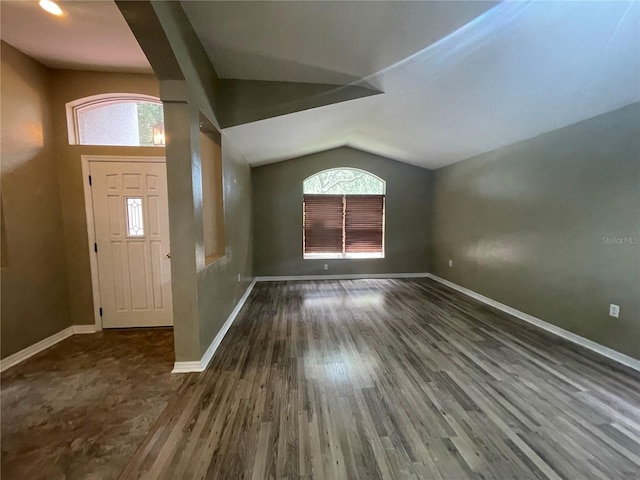 4731 Portobello Cir, Valrico, FL 33596 - entrance foyer featuring lofted ceiling, wood finished floors, healthy amount of natural light, and baseboards