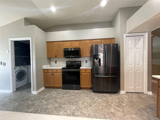 4731 Portobello Cir, Valrico, FL 33596 - kitchen featuring refrigerator with ice dispenser, electric range, stainless steel microwave, washer / dryer, and brown cabinetry