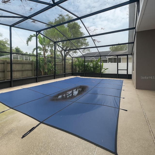 4731 Portobello Cir, Valrico, FL 33596 - view of pool with glass enclosure and a patio
