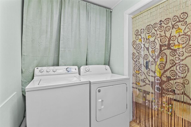 1411 Barry St, Clearwater, FL 33756 - laundry area with washer and clothes dryer