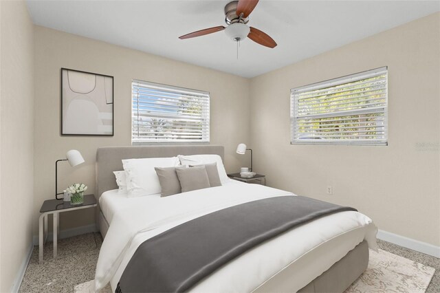 1411 Barry St, Clearwater, FL 33756 - bedroom featuring baseboards and a ceiling fan