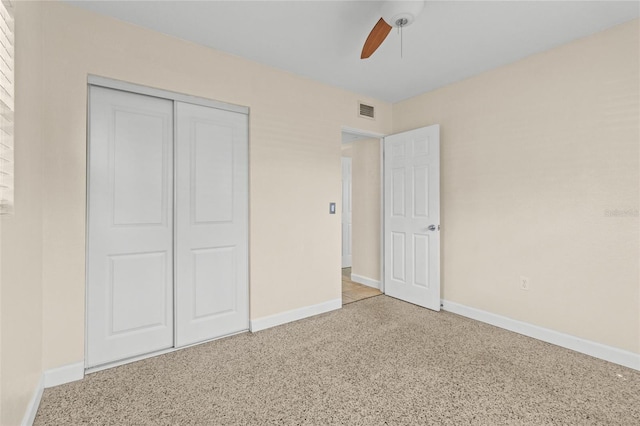 1411 Barry St, Clearwater, FL 33756 - unfurnished bedroom featuring a closet, speckled floor, baseboards, visible vents, and ceiling fan