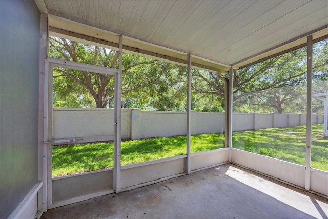 unfurnished sunroom featuring plenty of natural light