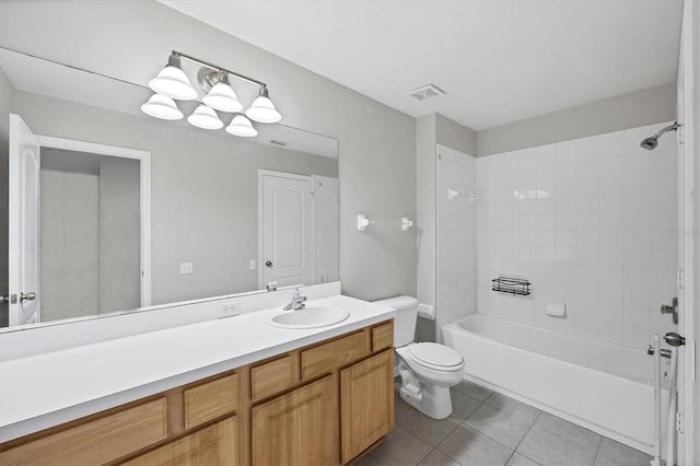 4920 Pond Ridge Dr, Riverview, FL 33578 - bathroom featuring toilet, tile patterned floors, vanity, and bathtub / shower combination