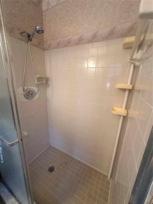bathroom with a stall shower