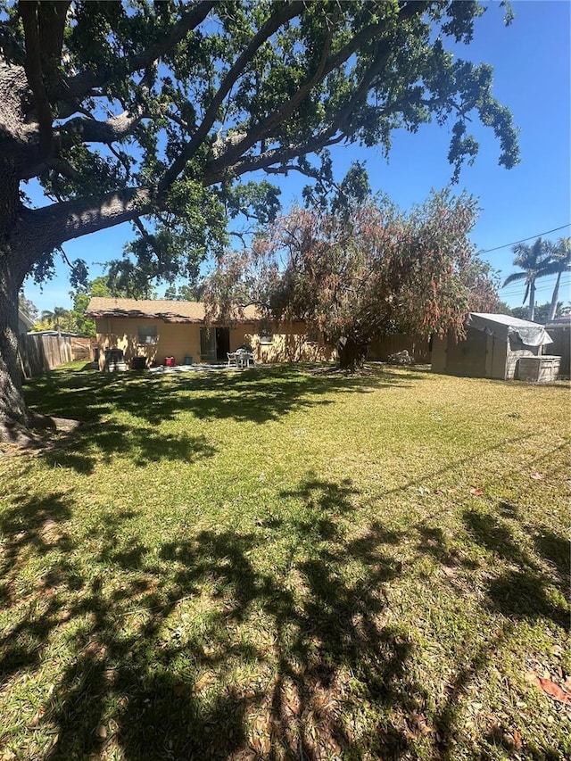 view of yard with fence