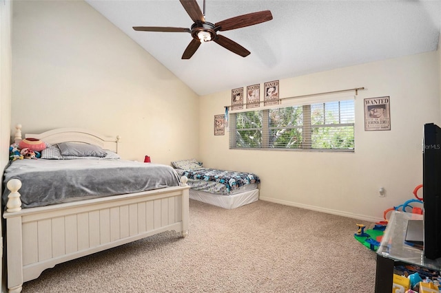 carpeted bedroom with lofted ceiling, a ceiling fan, and baseboards