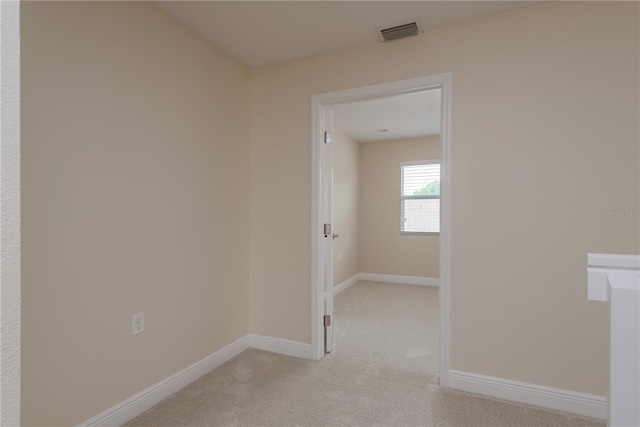 19123 Sunset Bay Dr, Land O Lakes, FL 34638 - spare room with baseboards, light colored carpet, and visible vents
