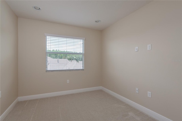 19123 Sunset Bay Dr, Land O Lakes, FL 34638 - unfurnished room with light colored carpet, recessed lighting, and baseboards