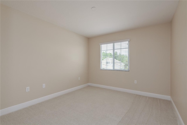 19123 Sunset Bay Dr, Land O Lakes, FL 34638 - empty room with baseboards and light colored carpet
