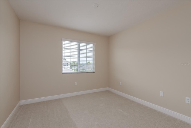 19123 Sunset Bay Dr, Land O Lakes, FL 34638 - empty room with baseboards and light carpet