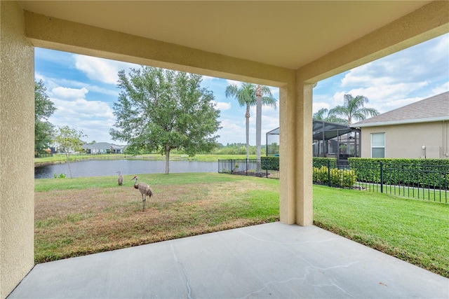 19123 Sunset Bay Dr, Land O Lakes, FL 34638 - view of patio / terrace with a water view and a fenced backyard