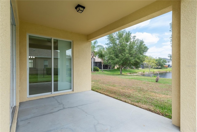 19123 Sunset Bay Dr, Land O Lakes, FL 34638 - view of patio with a water view
