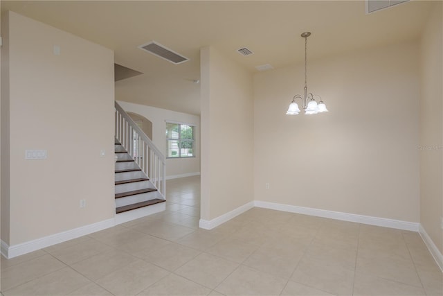19123 Sunset Bay Dr, Land O Lakes, FL 34638 - spare room featuring baseboards, a notable chandelier, light tile patterned flooring, and visible vents