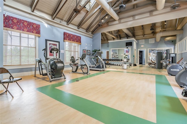 19123 Sunset Bay Dr, Land O Lakes, FL 34638 - workout area with baseboards, high vaulted ceiling, wood ceiling, and wood finished floors