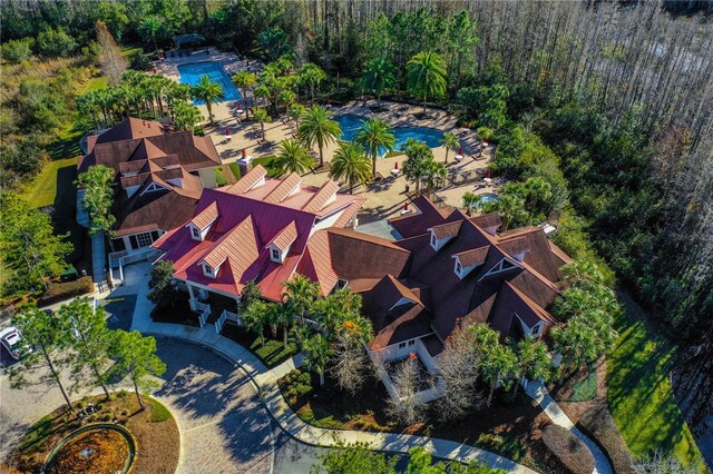 19123 Sunset Bay Dr, Land O Lakes, FL 34638 - drone / aerial view featuring a wooded view