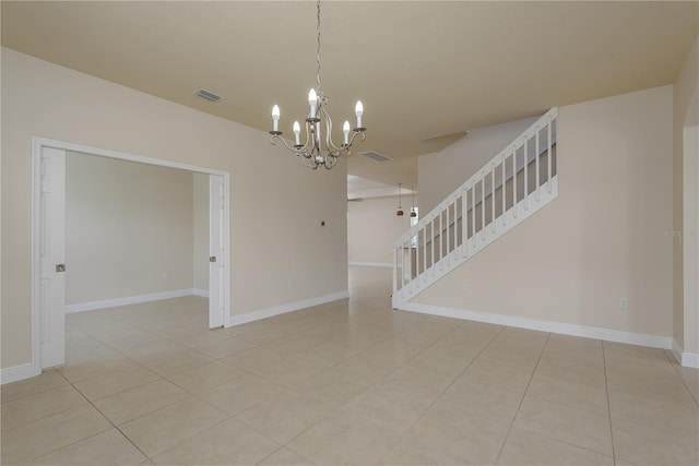 19123 Sunset Bay Dr, Land O Lakes, FL 34638 - spare room with a chandelier, visible vents, light tile patterned floors, and stairway