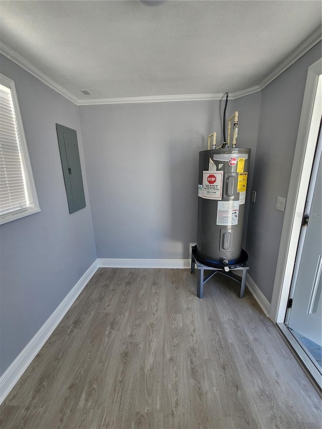4619 Helena St NE, Saint Petersburg, FL 33703 - utility room featuring water heater and electric panel