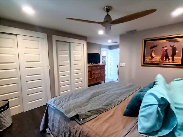 bedroom featuring multiple closets, visible vents, ceiling fan, and recessed lighting