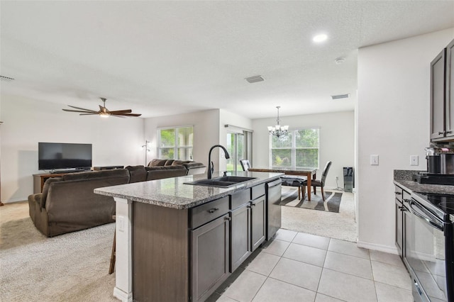6882 Silverado Ranch Blvd, Zephyrhills, FL 33541 - kitchen with black electric range oven, light carpet, a sink, and a wealth of natural light