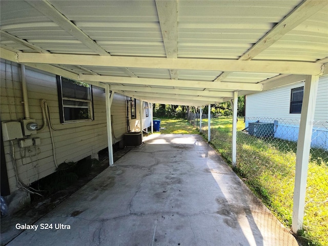 851 Easy St, Brooksville, FL 34601 - view of car parking with a carport and fence