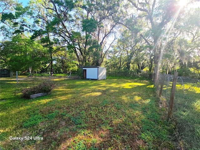 851 Easy St, Brooksville, FL 34601 - view of yard featuring a shed and an outdoor structure