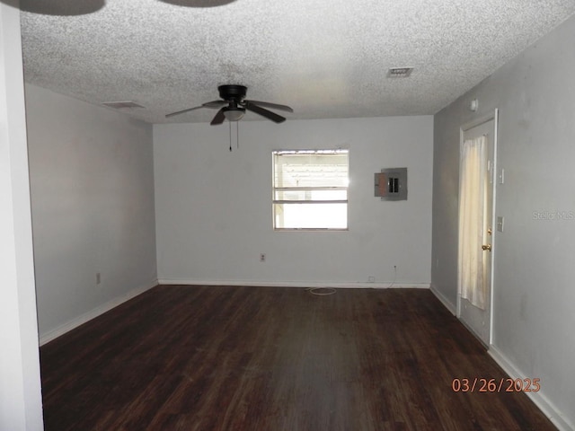 851 Easy St, Brooksville, FL 34601 - unfurnished room with visible vents, electric panel, baseboards, ceiling fan, and wood finished floors