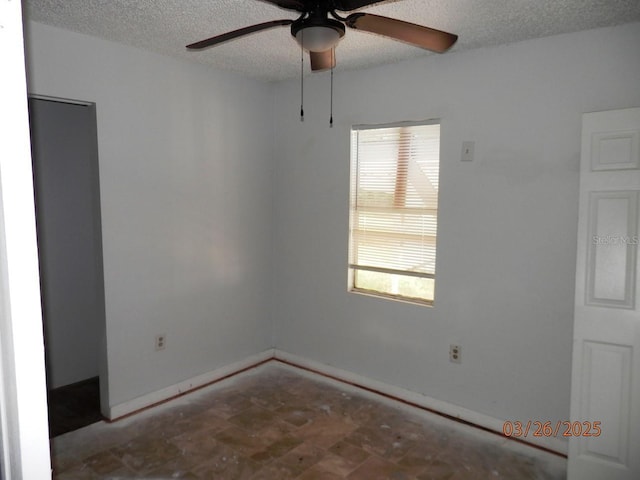 851 Easy St, Brooksville, FL 34601 - spare room with ceiling fan and a textured ceiling