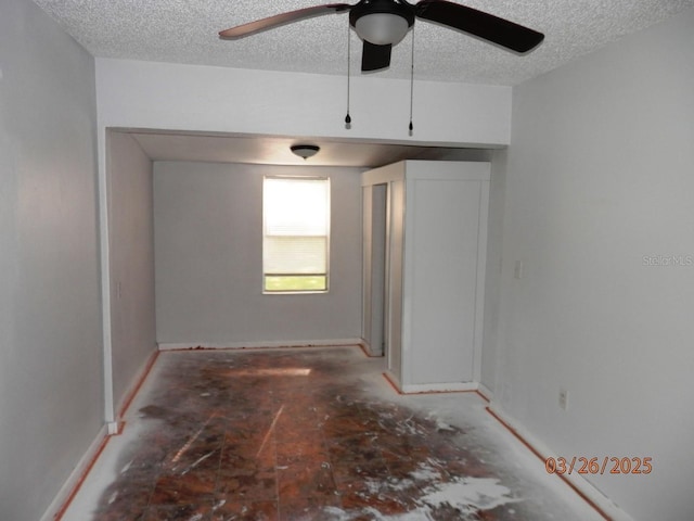 851 Easy St, Brooksville, FL 34601 - empty room featuring a ceiling fan and a textured ceiling
