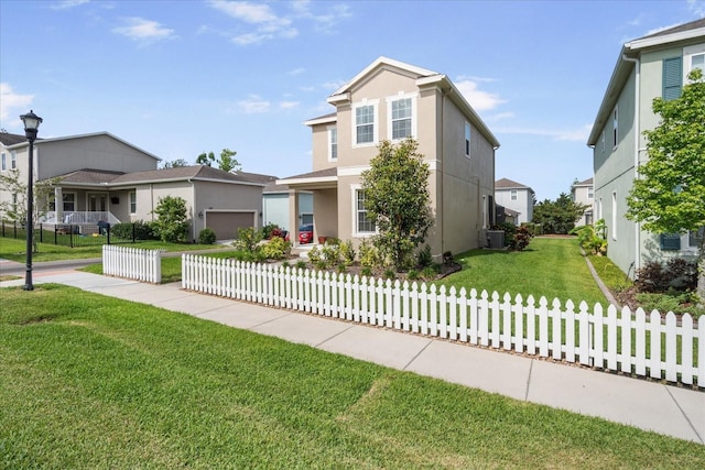traditional-style house featuring a residential view, central air condition unit, stucco siding, and fence private yard