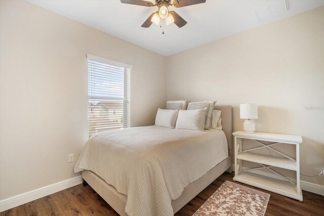 11109 Great Neck Rd, Riverview, FL 33578 - bedroom with dark wood-style floors and a ceiling fan