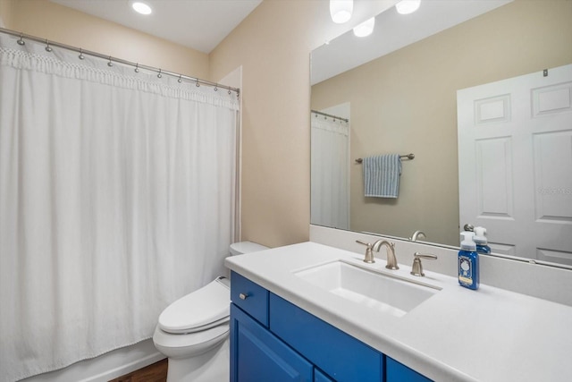 11109 Great Neck Rd, Riverview, FL 33578 - bathroom with vanity, wood finished floors, and recessed lighting