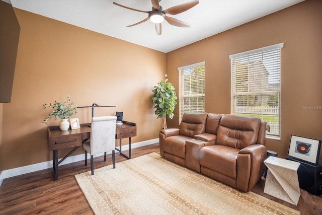 11109 Great Neck Rd, Riverview, FL 33578 - living room featuring a ceiling fan, wood finished floors, and a desk