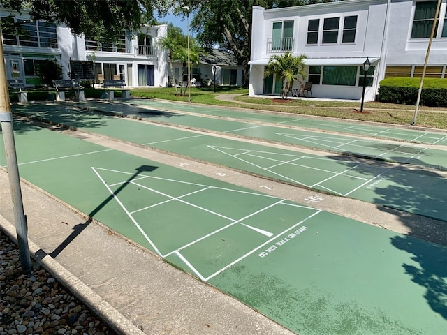 1655 S Highland Ave Unit I286, Clearwater, FL 33756 - surrounding community with shuffleboard and a lawn