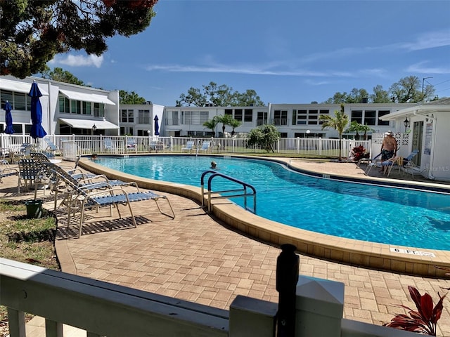 1655 S Highland Ave Unit I286, Clearwater, FL 33756 - community pool featuring a patio area