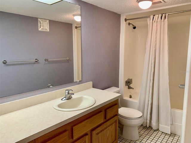 1655 S Highland Ave Unit I286, Clearwater, FL 33756 - full bathroom featuring shower / bath combo, vanity, a textured ceiling, toilet, and tile patterned flooring