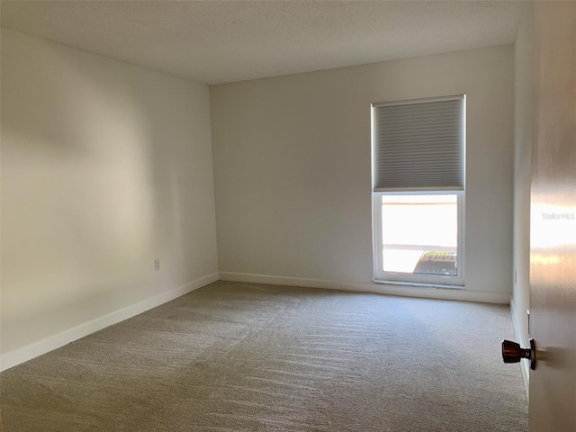1655 S Highland Ave Unit I286, Clearwater, FL 33756 - empty room featuring carpet floors and baseboards