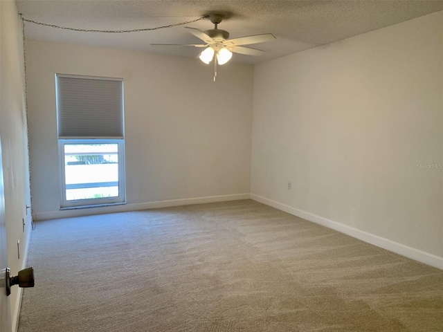 1655 S Highland Ave Unit I286, Clearwater, FL 33756 - carpeted spare room featuring ceiling fan, baseboards, and a textured ceiling