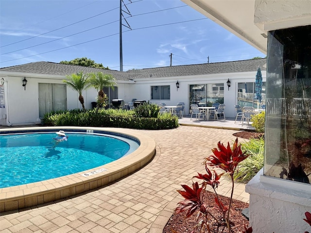 1655 S Highland Ave Unit I286, Clearwater, FL 33756 - community pool with a patio
