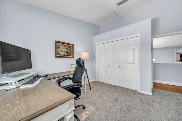 13122 Prestwick Dr, Riverview, FL 33579 - home office with visible vents, baseboards, and carpet flooring